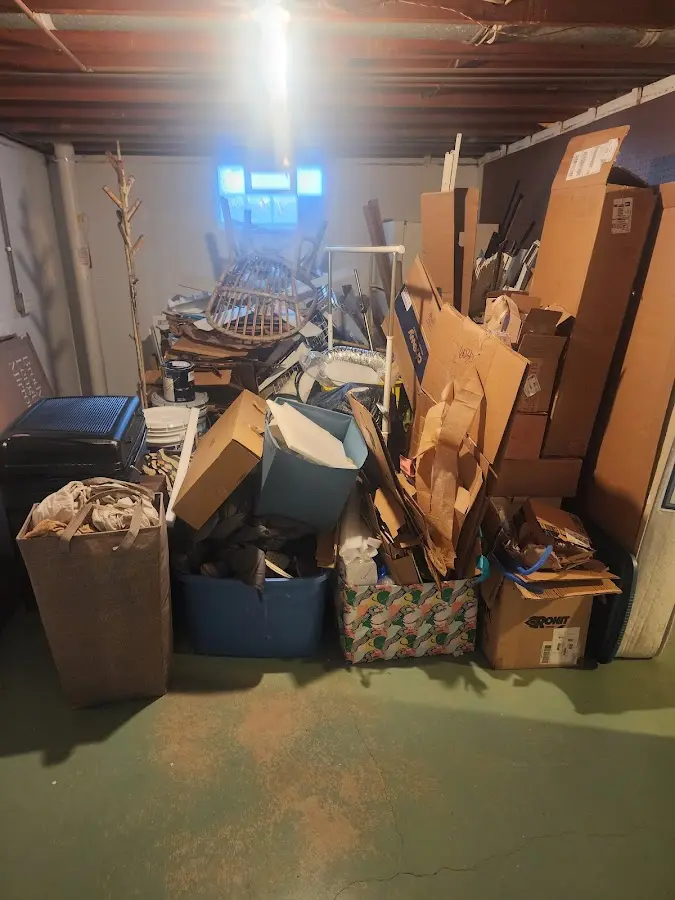 Roll-off dumpster container at job site for 4 Yard Dumpster Rental in Green Tree